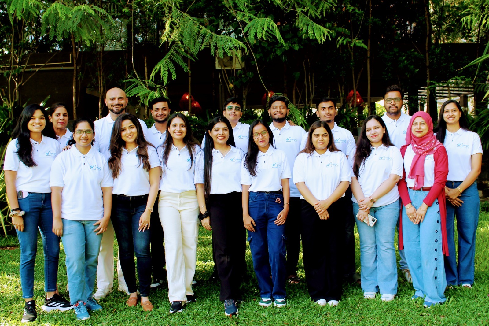 easyQ Solutions team meeting in modern office