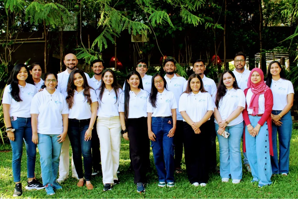 easyQ Solutions team meeting in modern office